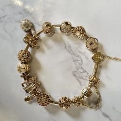 Authentic 14k Yellow Gold Pandora Bracelet With 15 14k Gold Charms