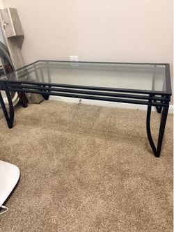 Coffee table with glass top