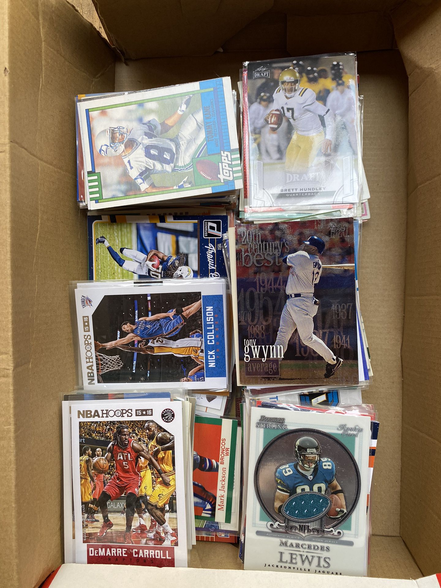 Box of 595 NFL, NBA, MLB, and WWE MISC CARDS