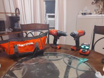 Craftsman Drill And Impact Drill Charger And Two 20v Batteries 