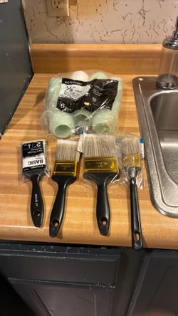 FOUR PAINT BRUSHES AND FOUR PAINT ROLLERS $10