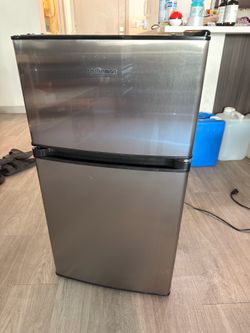 Upstreaman lightly used mini fridge