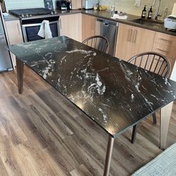 CB2 Black Marble Dining Table