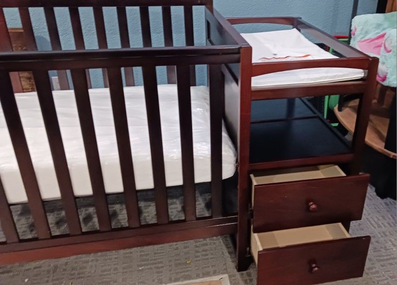 Delta Convertible Crib With Changing Table.