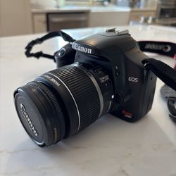 Canon ultrasound EOS. 18-55mm lens and a 70-300 lens.