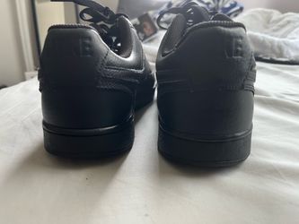 Nike black low