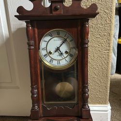 Kassel 31-day wind-up wall clock with a pendulum