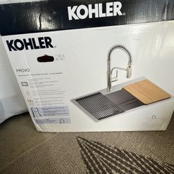 Kohler Provo 33" top-/undermount single-bowl workstation kitchen sink. Corner got bent in delivery.