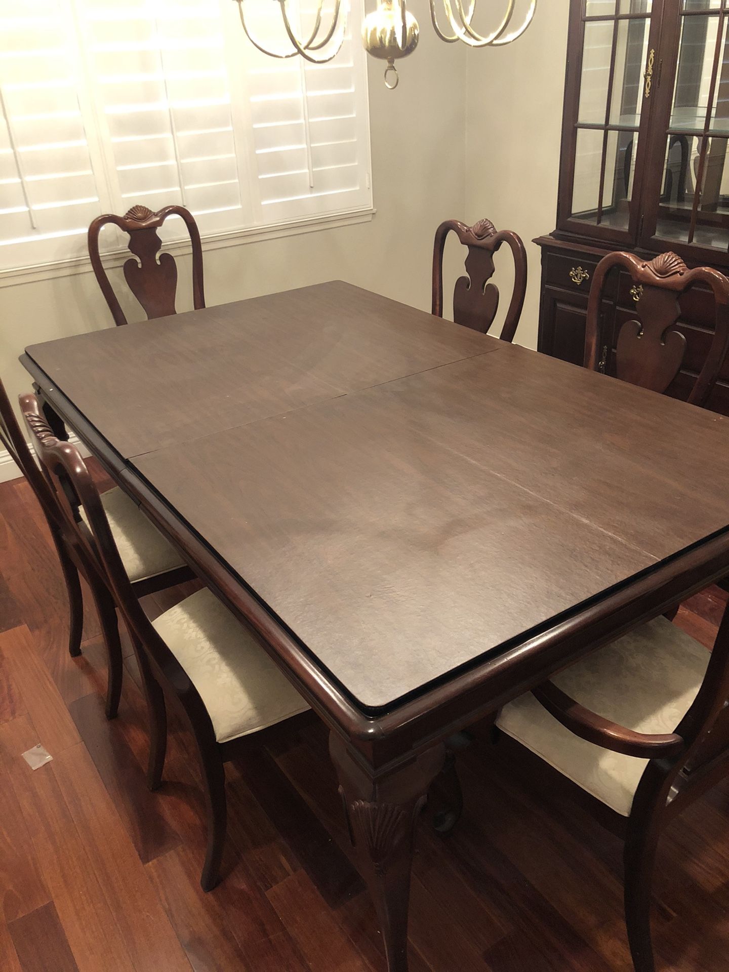 Hutch dining room table, chairs, and china cabinet