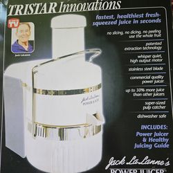 NEW Power juicing machine  in box never  used .  breand  new