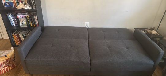 Futon couch folding