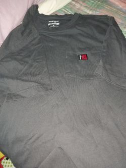 Men's wrangler t shirt with pocket in front size medium 12 dollars