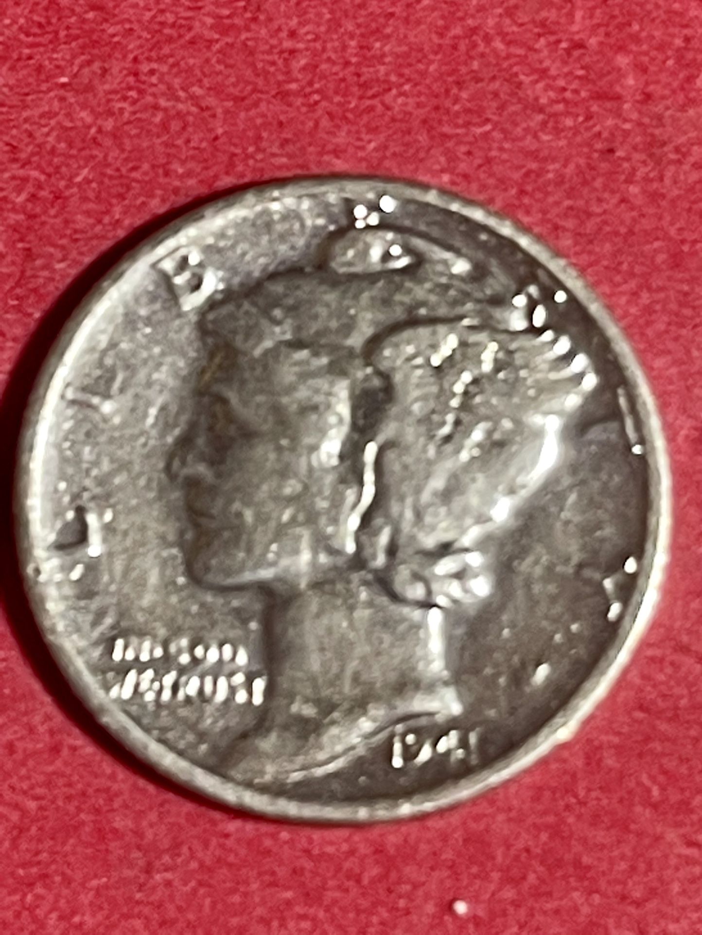 1942 s mercury dime with star error and also has solid bans on the columns on obverse side