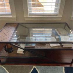 Coffee Table - Strong build with real wood and glass.