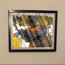 Custom art piece of lil dice from the Brazilian film city of god in black frame