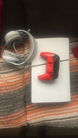 PlayStation 5 Console with Red DualSense Controller