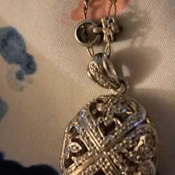 Silver Pendant Encrusted In Stones 