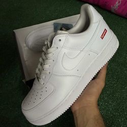 White supreme Air Force 1s