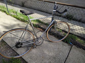 Silver Nishiki single speed road bike w new tires/ bullhorn