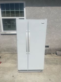 Delivery Available / Whirlpool side by side fridge refrigerator