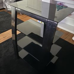 4 Shelves Black Glass TV stand. 