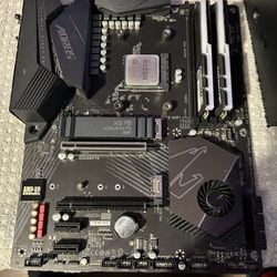 Motherboard, CPU, 2 Ram Sticks, CPU Cooler