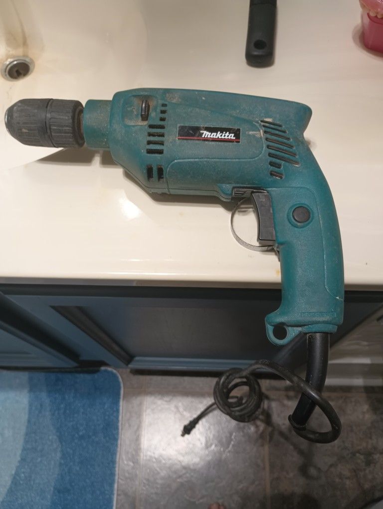 Drill With Drill Bits 