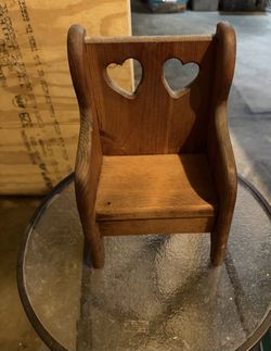 Vintage wooden doll chair with heart cut outs