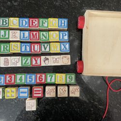 MELISSA & DOUG Wooden ABC 123 Blocks with Bag and Wagon Holder