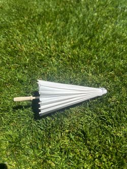 Selling white parasols! Cielito Lindo theme party! Outdoor wedding or quinceañera accessory!