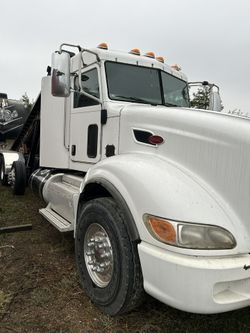 2013 Peterbilt 386 Roll Off Truck
