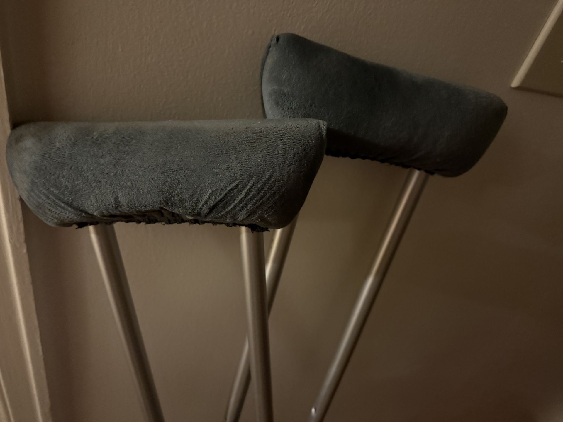 CRUTCHES WITH CUSHY GREY PADDING TO PREVENT BLISTERS