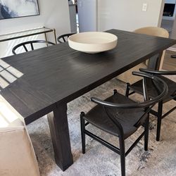 Wood dining table with extension leaves