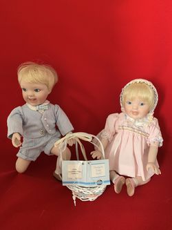 Dolls boy and girl with a basket Porcelain