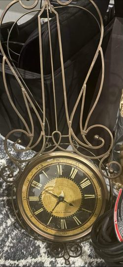VINTAGE METAL SCROLL STERLING AND NOBLE CLOCK COMPANY