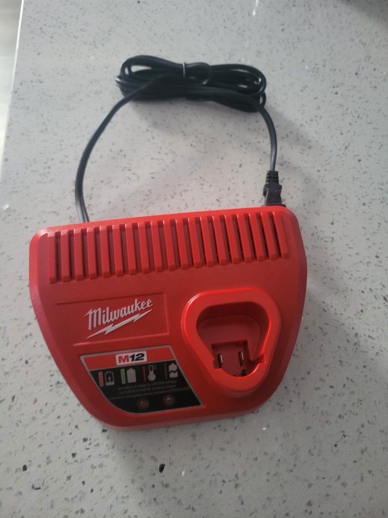 MILWAUKEE M12 CHARGER 
NEW. 11525  S HALSTED DUNKIN DONUTS/7111.S WESTERN WALGREENS 
15$  CASH ONLY 