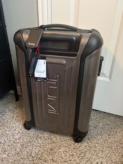 Tumi 19 Degree Polycarbonate International Carry-On - Brand New With Tags 5 year warranty
