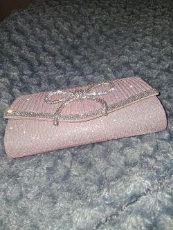 Sequence clutch with crossbody strap