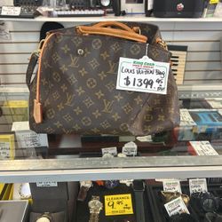 Lady’s Louis Vuitton Bag