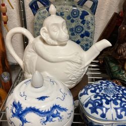 White Porcelain Monkey Teapot W/ Bamboo Hollywood Regency Handle $25.  Ruby Zen Buddha Head $25. Blue & White Ginger Jar $40. 