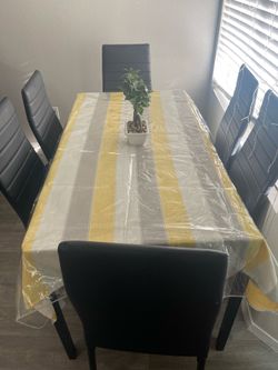 6 seater black dinning table and chair set