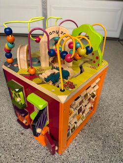 B. toys Zany Zoo Wooden Activity Cube