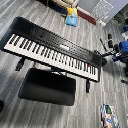 Yamaha Piano With Chair