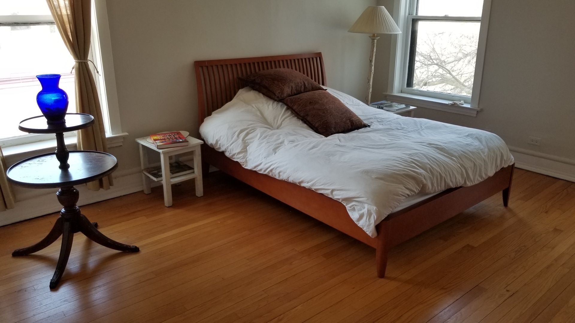 539 Sheridan road Evanston 60202 Queen size cherry wood bed frame. Top quality futon mattress. 2 wood side tables. Round antique table. 400$ Armoir