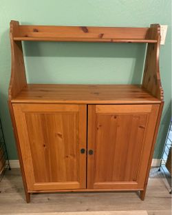Hard to find IKEA Solid Wood Cabinet with Hutch – Natural Pine.”