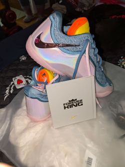 Nike LeBron 23 "Miami Twice" features a distinctive translucent upper with palm tree graphics and a prominent metallic swoosh.