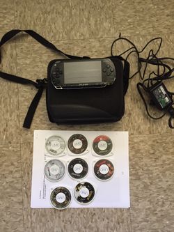 PSP console+ 8 games almost new