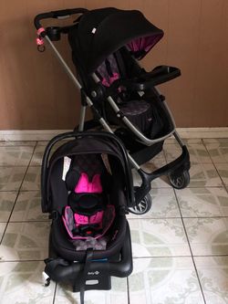 LIKE NEW MINNIE MOUSE TRAVEL SYSTEM STROLLER CAR SEAT AND BASSINET 3 IN 1