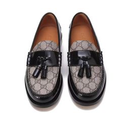 Gucci canvas fringed decorated mocassin loafersThe size is 9.5.