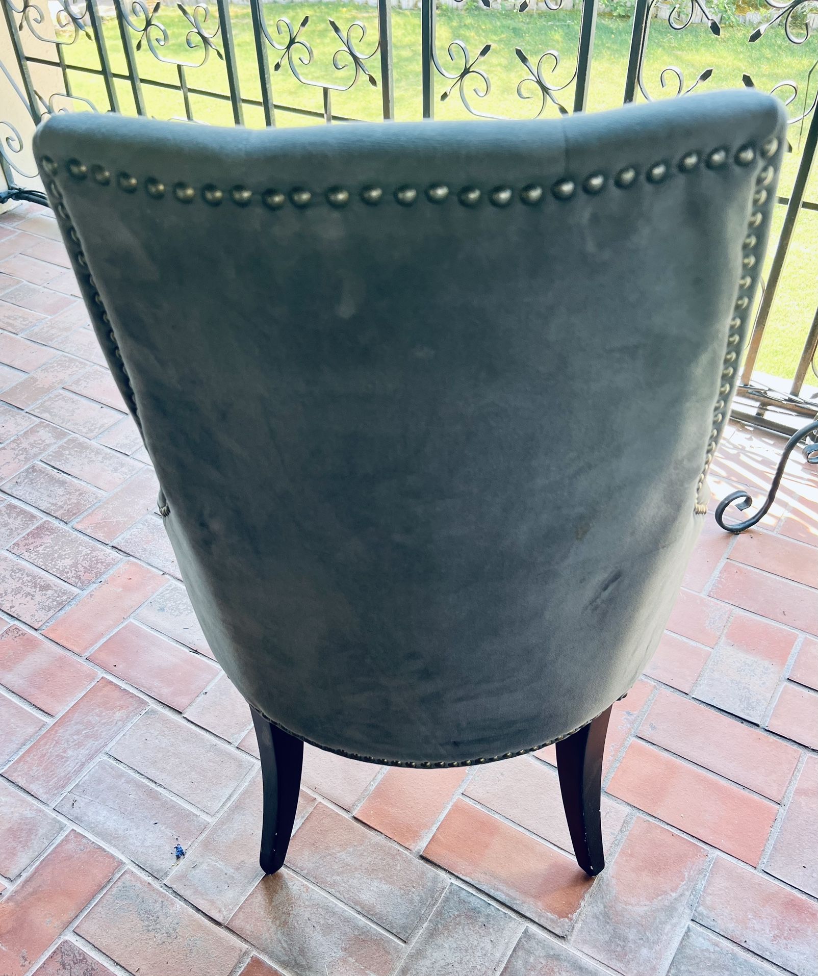 Gray Sitting Chair With Metal Beaded Back 